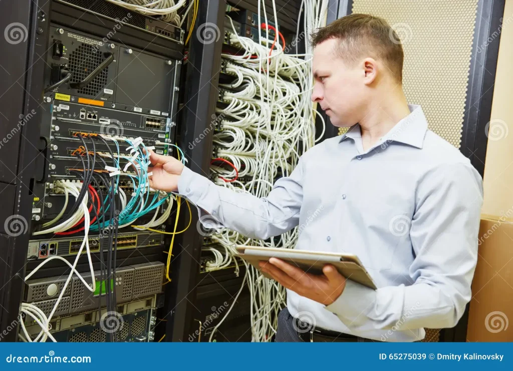 network engineer admin data center networking service administrator checking server hardware equipment 65275039